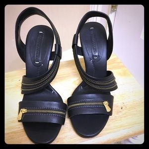 BCBGamaxazria black leather heels zipper embellish